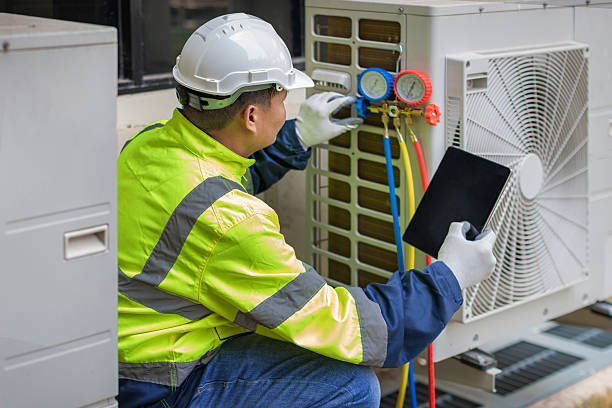 Professional Ac Repair technician working in Mansfield Center, MA